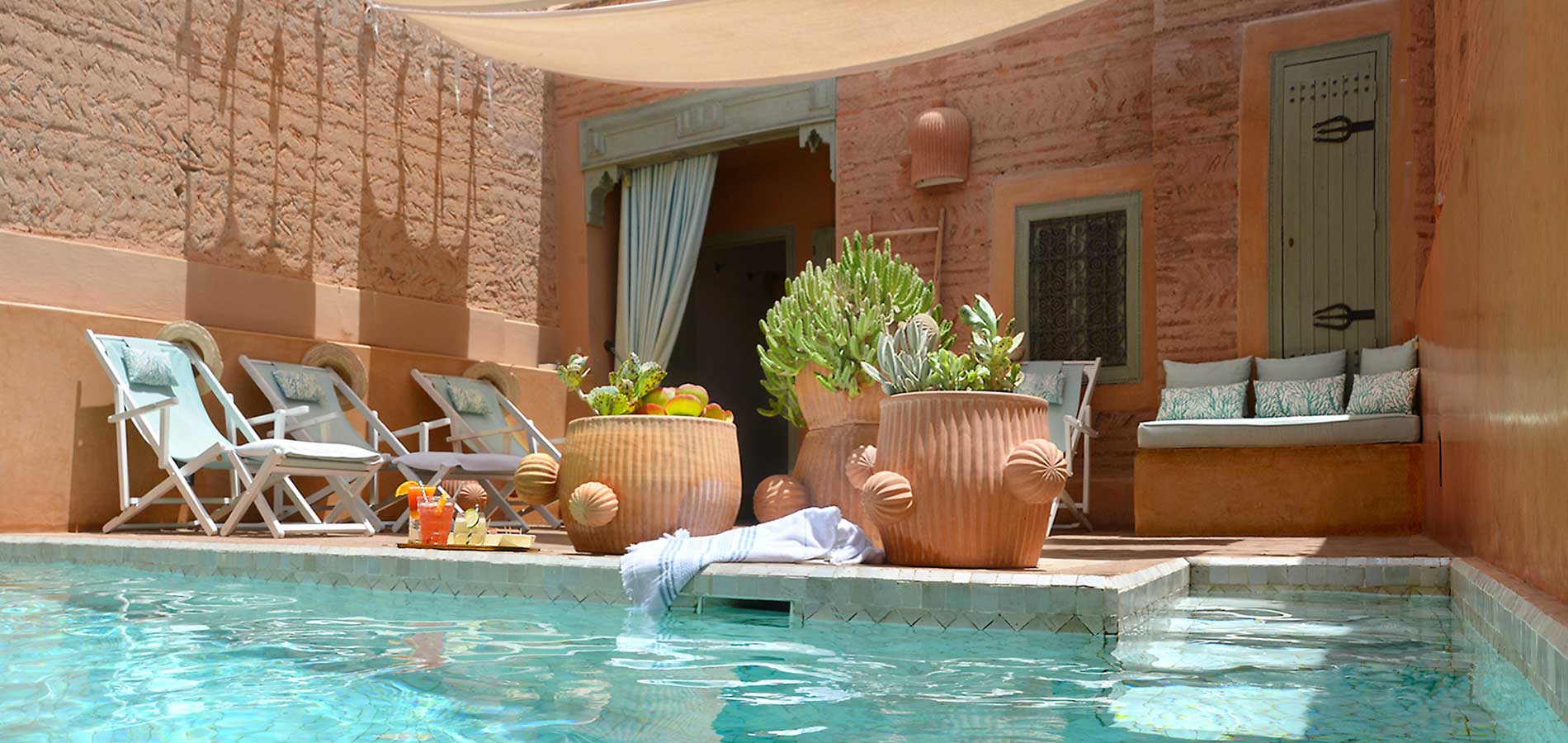 swimming pool of the riad Dar Housnia in Marrakech